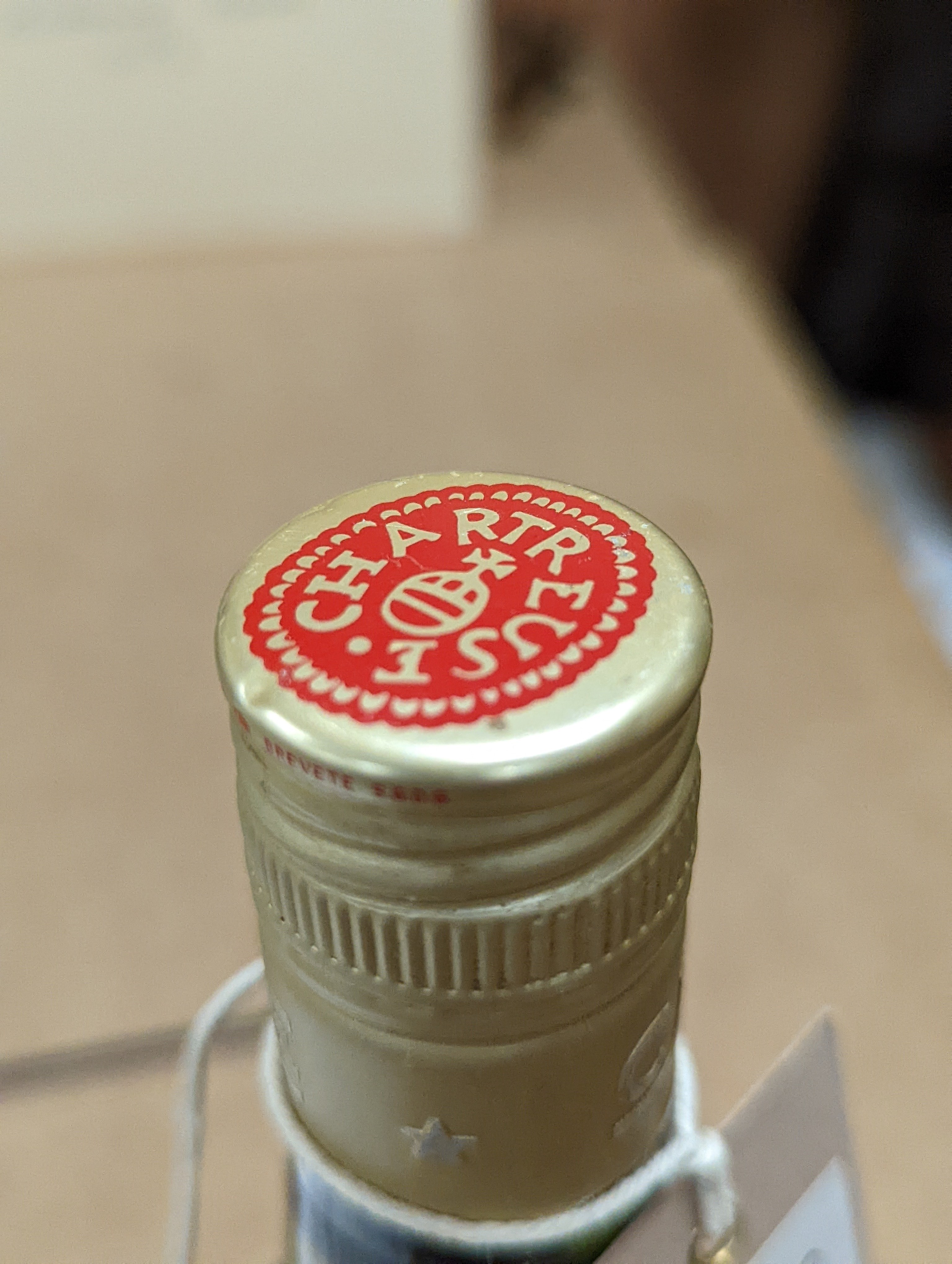 One Chartreuse bottle and ten Chartreuse miniatures
